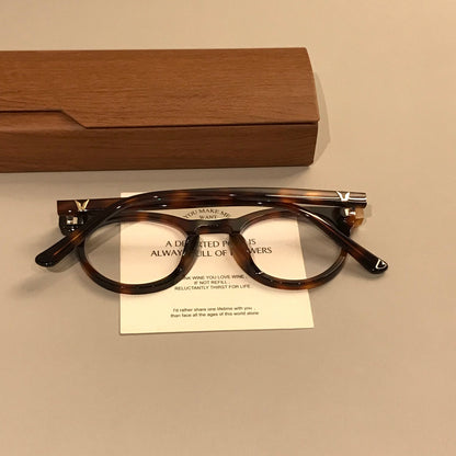 
Monturas de gafas ovaladas compactas con aros gruesos, negro o carey - Imagen 10
