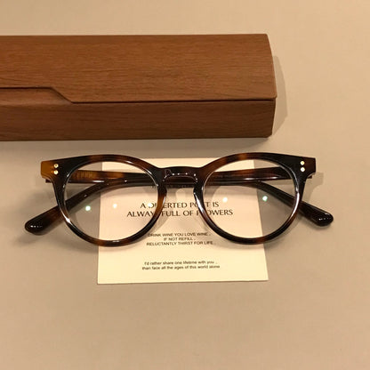 
Monturas de gafas ovaladas compactas con aros gruesos, negro o carey - Imagen 11
