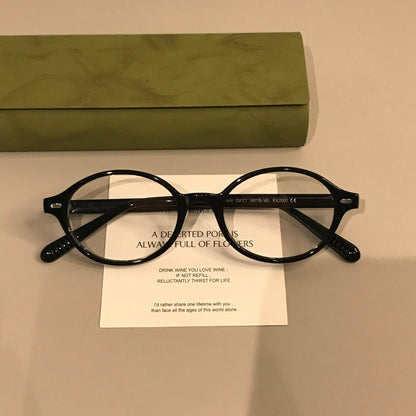 
Monturas de gafas ovaladas retro con frente de perfil bajo, en negro o carey - Imagen 3