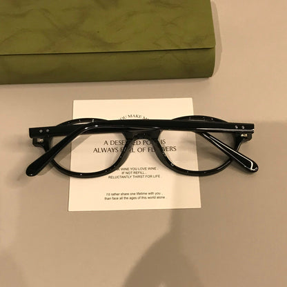 
Monturas de gafas ovaladas retro con frente de perfil bajo, en negro o carey - Imagen 5