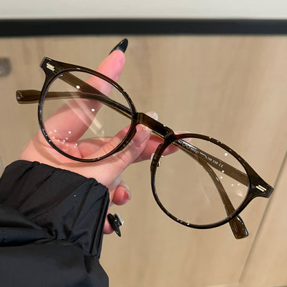 
Monturas de gafas de ojo de gato redondeadas con esquinas exteriores elevadas, marrón té caramelo, negro o carey