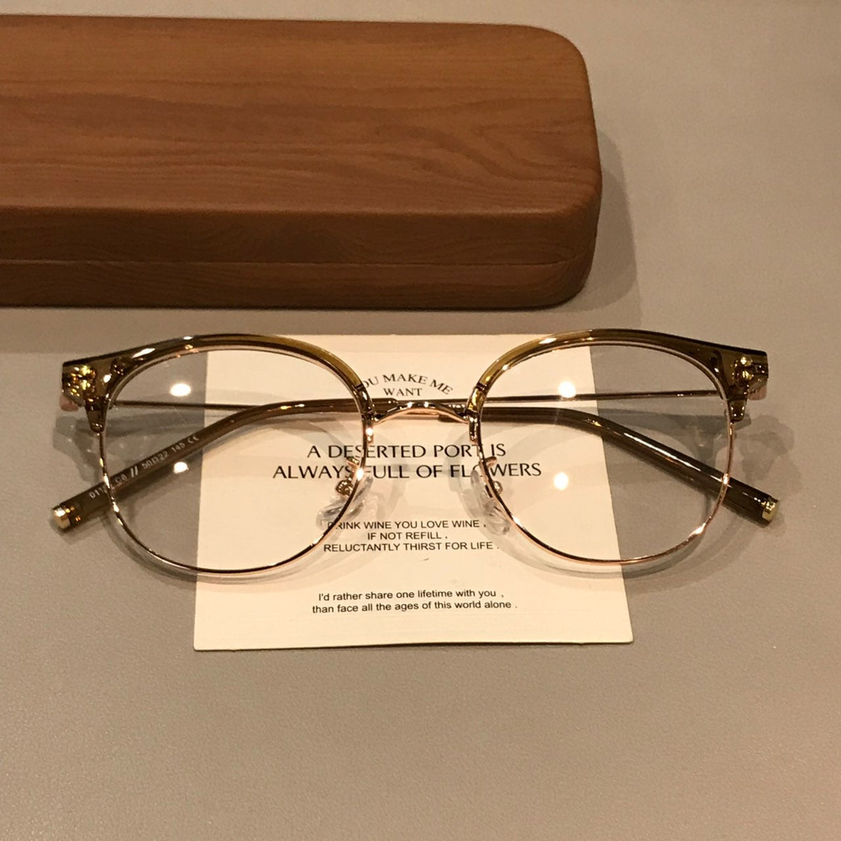
Monturas de gafas retro tipo Browline con frente curvado, marrón té/dorado o gris transparente