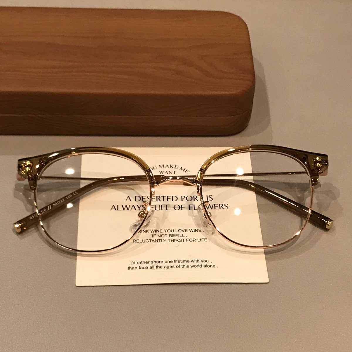 
Monturas de gafas retro tipo Browline con frente curvado, marrón té/dorado o gris transparente