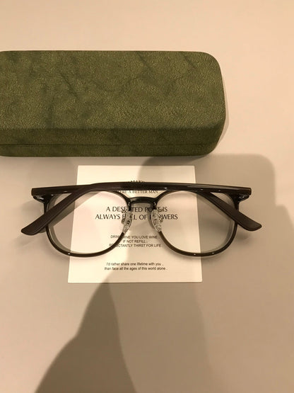 
Monturas de gafas redondas y compactas con detalles en las esquinas, negro, marrón café o carey - Imagen 10
