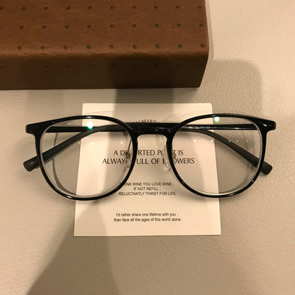 
Monturas de gafas cuadradas con bordes finos y puente curvo, negras