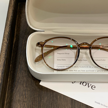 
Montura de gafas redonda con bordes finos y ceja curva, color marrón té frío - Imagen 2