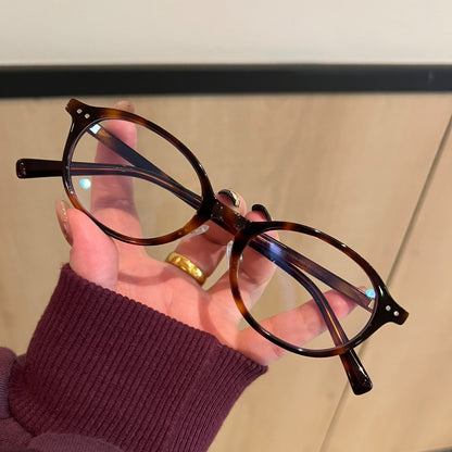 
Monturas de gafas retro cuadradas redondeadas con bordes anchos, carey