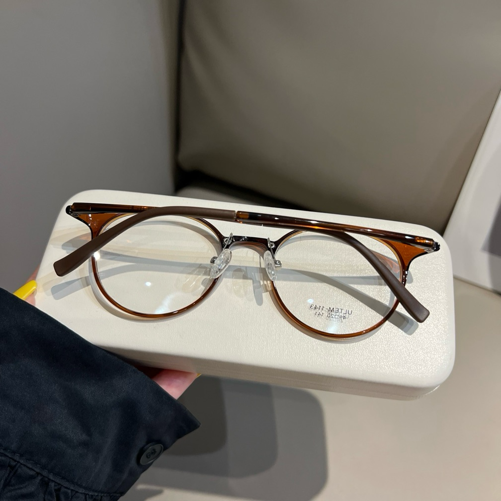 
Monturas de gafas redondas compactas con bordes finos, marrón castaño o negro - Imagen 4