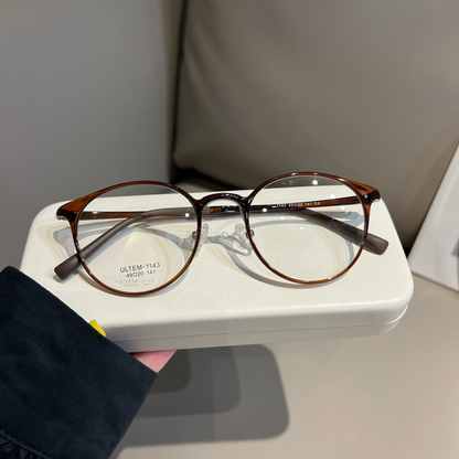 
Monturas de gafas redondas compactas con bordes finos, marrón castaño o negro - Imagen 7