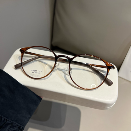
Monturas de gafas redondas compactas con bordes finos, marrón castaño o negro - Imagen 8