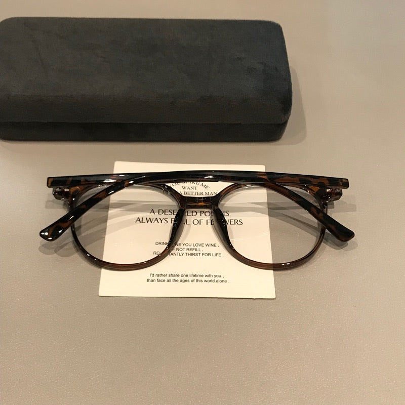
Monturas de gafas retro rectangulares redondeadas con aros gruesos, carey
