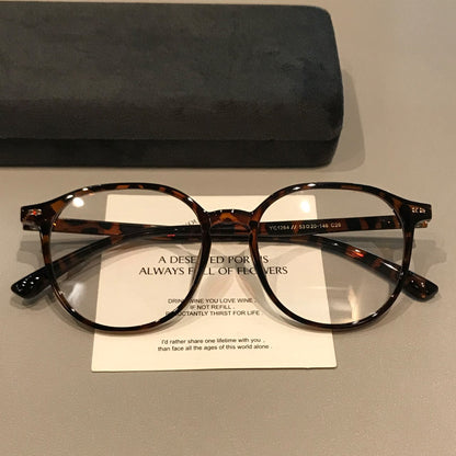 
Monturas de gafas retro rectangulares redondeadas con aros gruesos, carey