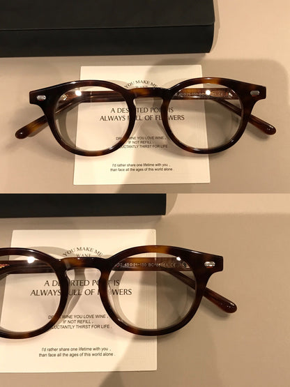 
Montura de gafas redonda retro con borde superior ancho, carey o negro brillante - Imagen 5