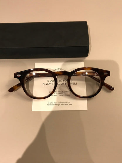 
Montura de gafas redonda retro con borde superior ancho, carey o negro brillante - Imagen 8