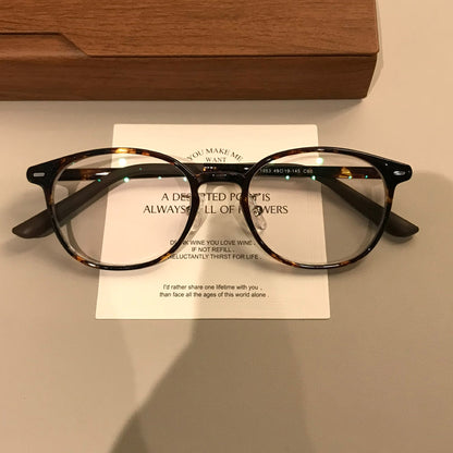 
Monturas de gafas retro compactas con frente cuadrado redondeado, en carey o negro - Imagen 7