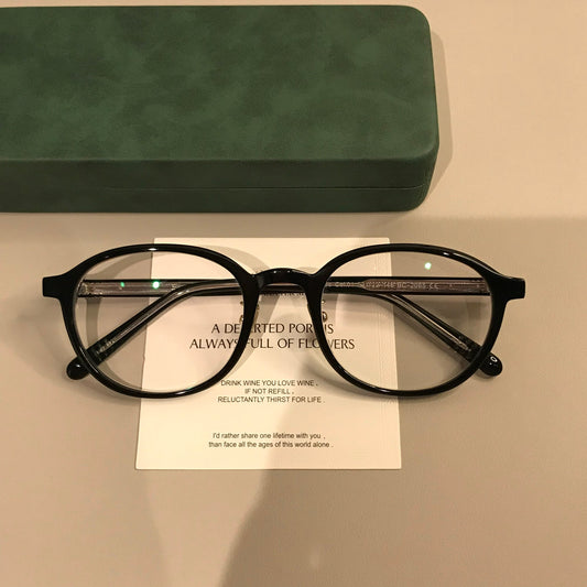 Montura de gafas redondas para hombre con aros y varillas finos, negro