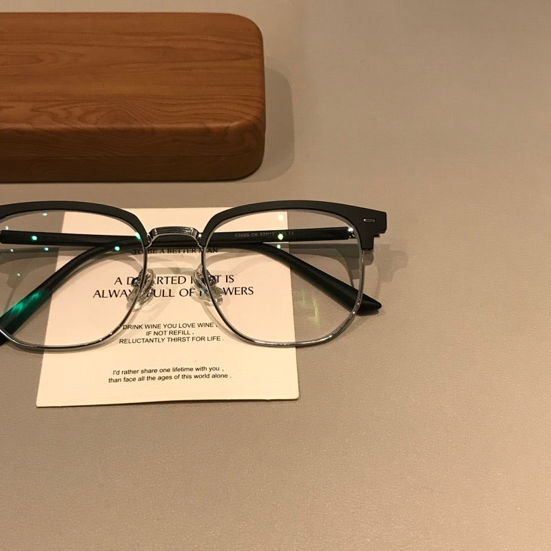 
Montura de gafas rectangular estilo browline para hombre con acabado mate, negro