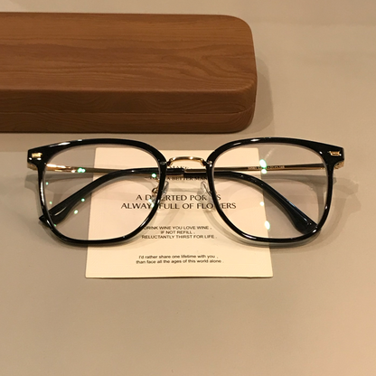 
Monturas de gafas rectangulares anchas para hombre con remaches en las esquinas, negras