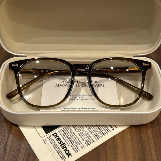 Monturas de gafas redondeadas de gran tamaño con ceja suave, marrón, gris, negro o verde oliva