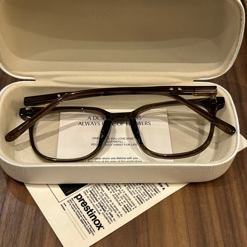 
Monturas de gafas redondeadas de gran tamaño con ceja suave, marrón, gris, negro o verde oliva